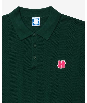 UNDEFEATED S/S KNIT POLO est présent 