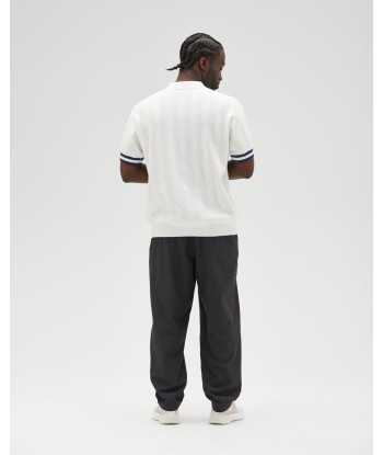 UNDEFEATED S/S KNIT POLO est présent 