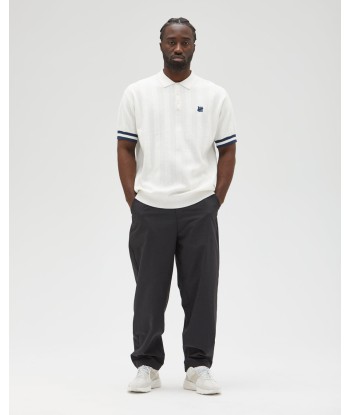 UNDEFEATED S/S KNIT POLO est présent 