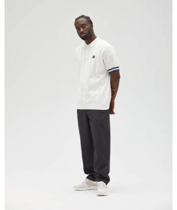 UNDEFEATED S/S KNIT POLO est présent 